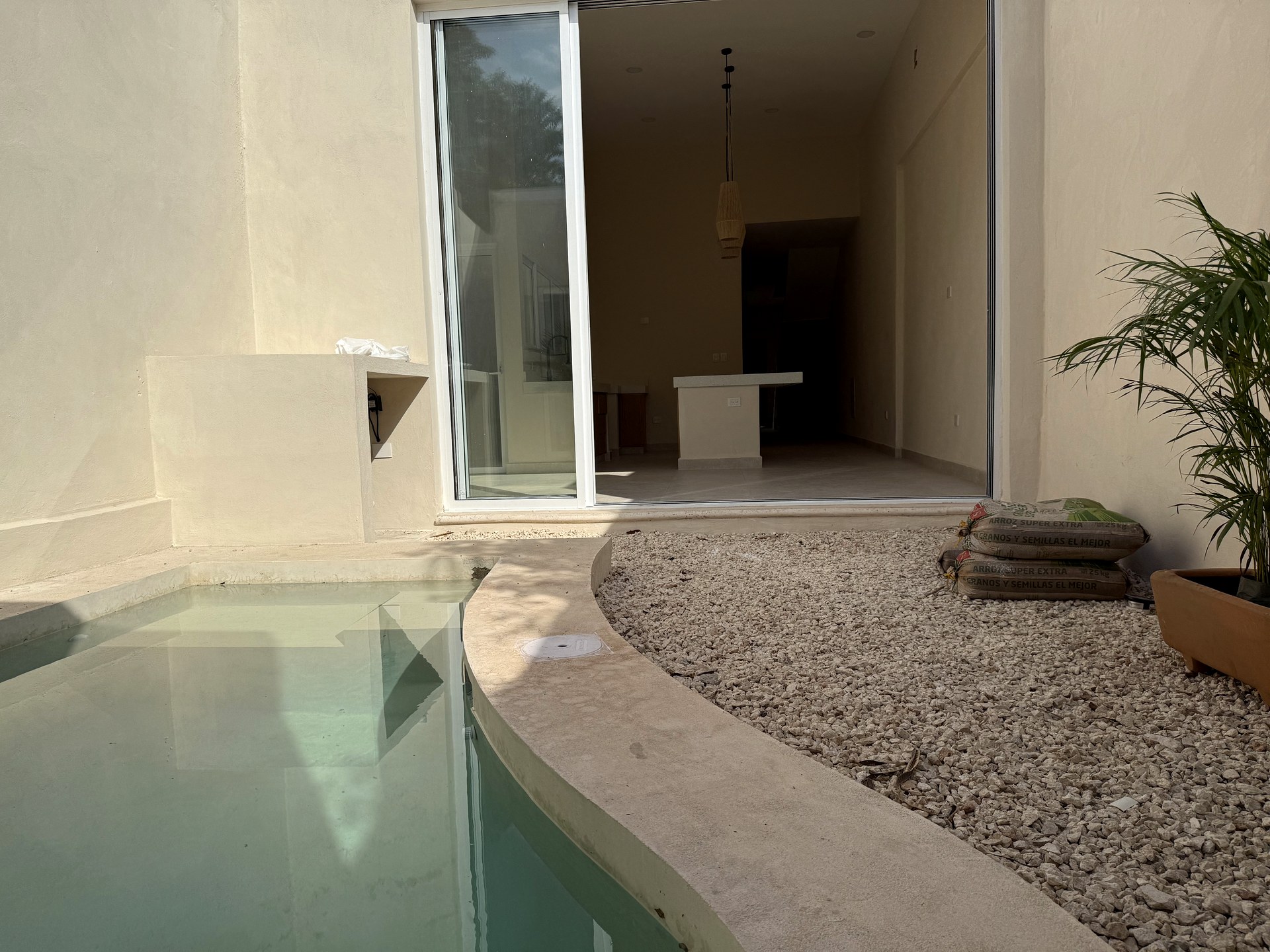 Casa Suspiro — private courtyard with swimming pool and tropical landscaping