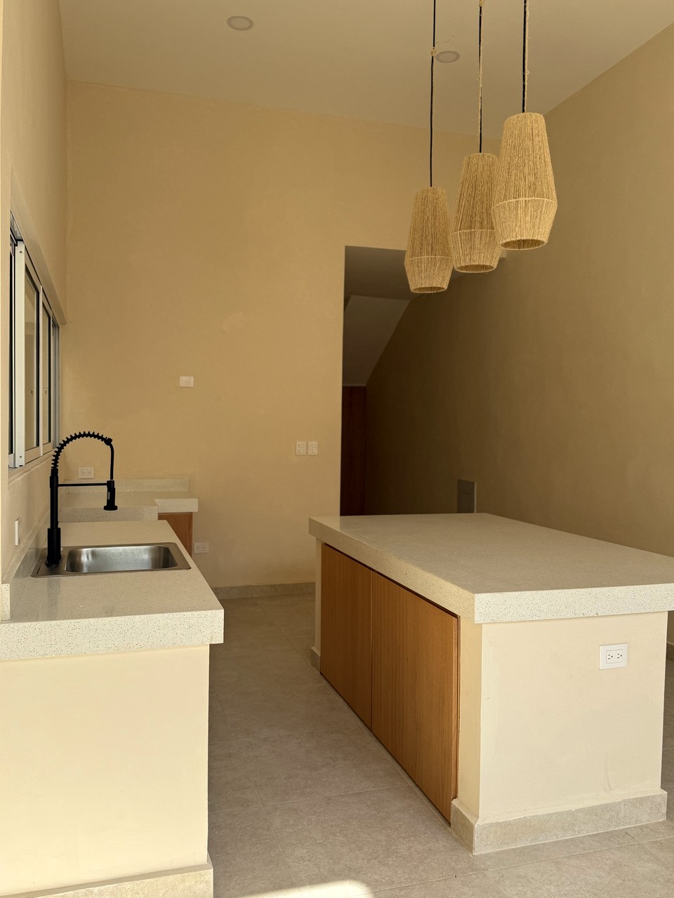 Casa Suspiro — kitchen detail showing countertops, sink, and cabinetry